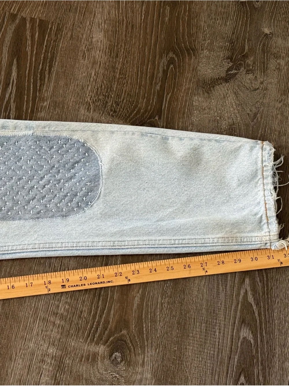 Vintage orange tab Y2K Light Blue Distressed Men’s Jeans with Patch Detail